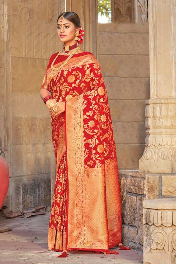 Celebrate This Festive Season In This Very Pretty Red Colored Designer Saree Paired With Blouse. This Saree and Blouse Are Silk Based Beautified With Detailed Wevon Designer Work. 