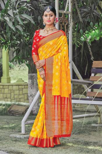 Look Attractive Wearing This Fine Colored Saree Paired With Contrasted Colored Blouse.  This Heavy Designer Wevon Saree Is Silk Based Which Gives A Rich Look To Your Personality. Buy This Pretty Saree Now.