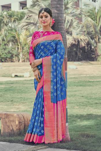 Look Attractive Wearing This Fine Colored Saree Paired With Contrasted Colored Blouse.  This Heavy Designer Wevon Saree Is Silk Based Which Gives A Rich Look To Your Personality. Buy This Pretty Saree Now.