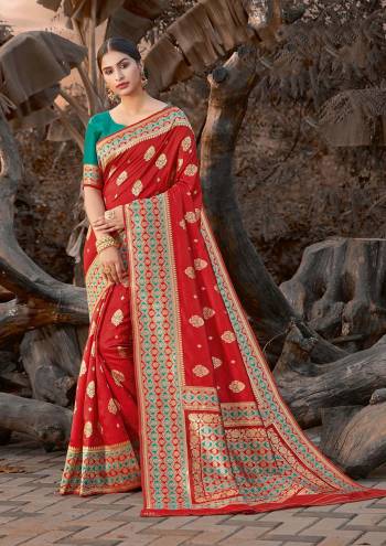 Grab This Pretty Elegant Looking Designer Saree In Dark Color Paired With Contrasting Colored Blouse. This Saree And Blouse Are Silk Based Beautified With Wevon Border And Sirki Work. Buy Now.