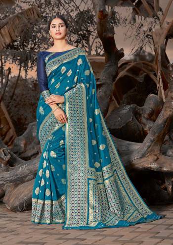 Grab This Pretty Elegant Looking Designer Saree In Dark Color Paired With Contrasting Colored Blouse. This Saree And Blouse Are Silk Based Beautified With Wevon Border And Sirki Work. Buy Now.