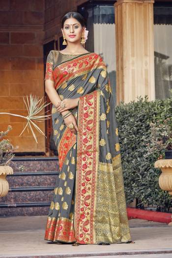 Adorn The Pretty Angelic Look Wearing This Heavy Wevon Jacquard Designer Saree In Fine Color Paired With Blouse. This Saree Is Fabricated On Silk Paired With Silk Fabricated Blouse. Its Pretty Color Pallete Will Give An Attractive Look To Your Personality. 