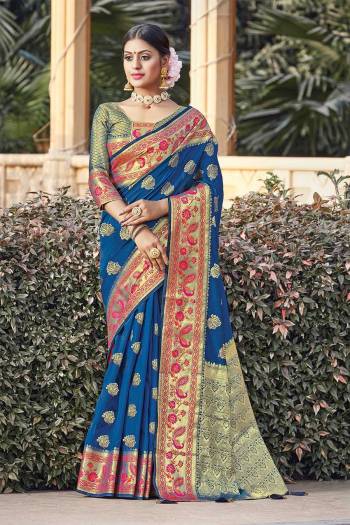 Adorn The Pretty Angelic Look Wearing This Heavy Wevon Jacquard Designer Saree In Fine Color Paired With Blouse. This Saree Is Fabricated On Silk Paired With Silk Fabricated Blouse. Its Pretty Color Pallete Will Give An Attractive Look To Your Personality. 