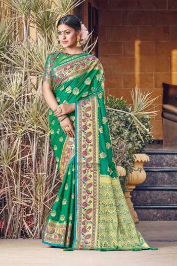 Adorn The Pretty Angelic Look Wearing This Heavy Wevon Jacquard Designer Saree In Fine Color Paired With Blouse. This Saree Is Fabricated On Silk Paired With Silk Fabricated Blouse. Its Pretty Color Pallete Will Give An Attractive Look To Your Personality. 