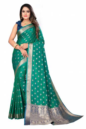 Adorn The Pretty Angelic Look Wearing This Weving Jacquard Designer Saree In Fine Color Paired With Contrasting Colored Blouse. This Saree Is Fabricated On Lichi Silk Paired With Lichi Silk Fabricated Blouse. Its Pretty Color Pallete Will Give An Attractive Look To Your Personality. 