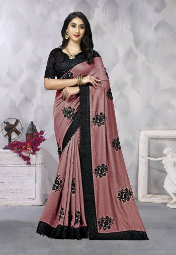 Look Attractive Wearing This Fine Dusty Colored Saree Paired With Black Colored Blouse.  This Heavy Designer Resham Embroidery,Black Stone, Moti Work With Heavy Black Border Saree Is Vichitra Silk Based Which Gives A Rich Look To Your Personality. Buy This Pretty Saree Now.