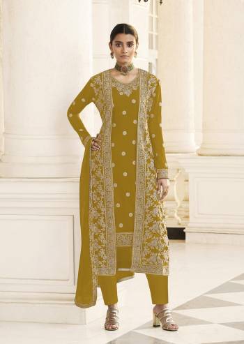 Get Ready For The Upcoming Festive And Wedding Season With This Designer Suit With Jacket In Fine Color Paired With Dupatta. Its Heacy Embroidered Top And Jacket Is Fabricated On Georgette Paired With Santoon Bottom And Georgette Fabricated Dupatta. It Is Light Weight And Easy To Carry Throughtout The Gala. Buy this Suit Now.