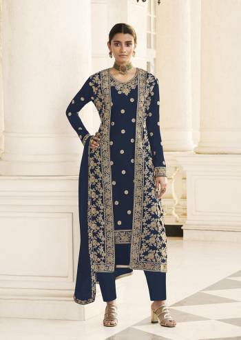 Get Ready For The Upcoming Festive And Wedding Season With This Designer Suit With Jacket In Fine Color Paired With Dupatta. Its Heacy Embroidered Top And Jacket Is Fabricated On Georgette Paired With Santoon Bottom And Georgette Fabricated Dupatta. It Is Light Weight And Easy To Carry Throughtout The Gala. Buy this Suit Now.