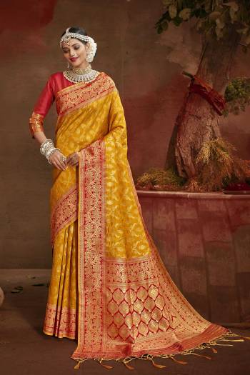 Celebrate This Festive Season In This Very Pretty Fine Colored Designer Saree Paired With Contrasting Blouse. This Saree and Blouse Are Banarasi Silk Based Beautified With Detailed Wevon Heavy Deasigner Work. 