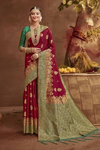 Celebrate This Festive Season In This Very Pretty Fine Colored Designer Saree Paired With Contrasting Blouse. This Saree and Blouse Are Banarasi Silk Based Beautified With Detailed Wevon Heavy Deasigner Work. 