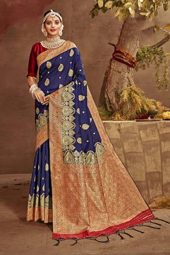 Celebrate This Festive Season In This Very Pretty Fine Colored Designer Saree Paired With Contrasting Blouse. This Saree and Blouse Are Banarasi Silk Based Beautified With Detailed Wevon Heavy Deasigner Work. 