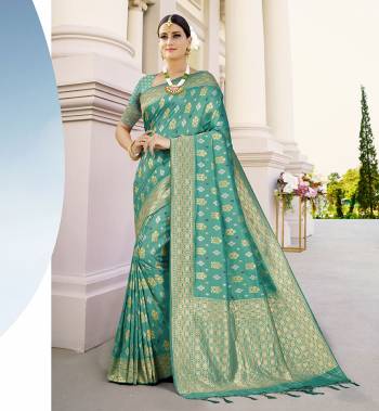 Adorn The Pretty Angelic Look Wearing This Heavy Weving Designer Saree With Blouse. This Saree Is Fabricated On Banarasi Silk Paired With Banarasi Silk Fabricated Blouse. Its Pretty Color Pallete Will Give An Attractive Look To Your Personality. 