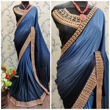 Grab This Pretty Elegant Looking Designer Party Wear Saree In Shaded Color Paired With Contrasting Black Colored Blouse. This Saree Are Lycara Shaded And Blouse Are Banglori Silk Based With Heavy Embroidery Work With Lace Border Beautified Saree. Buy Now.