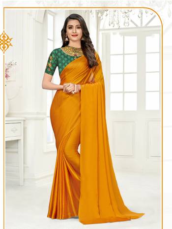 Look Attractive Wearing This Saree Paired With Contrased Colored Blouse.  This Heavy Saree Is Columbus chiffon Based Dyed And Blouse In Satin Based With Designer Printed With Diamond Work.Which Gives A Rich Look To Your Personality. Buy This Pretty Saree Now.