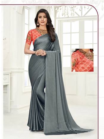 Look Attractive Wearing This Saree Paired With Contrased Colored Blouse.  This Heavy Saree Is Columbus chiffon Based Dyed And Blouse In Satin Based With Designer Printed With Diamond Work.Which Gives A Rich Look To Your Personality. Buy This Pretty Saree Now.