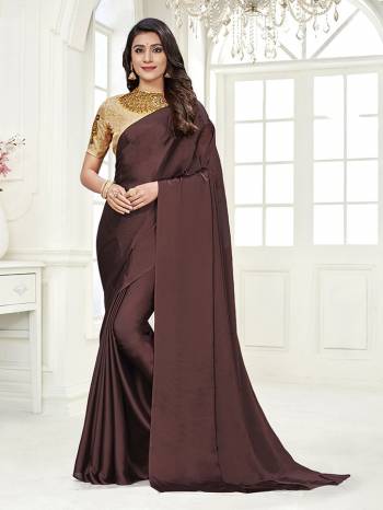 Look Attractive Wearing This Saree Paired With Contrased Colored Blouse.  This Heavy Saree Is Columbus chiffon Based Dyed And Blouse In Satin Based With Designer Printed With Diamond Work.Which Gives A Rich Look To Your Personality. Buy This Pretty Saree Now.