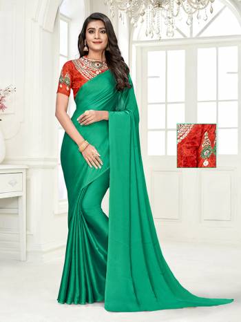 Look Attractive Wearing This Saree Paired With Contrased Colored Blouse.  This Heavy Saree Is Columbus chiffon Based Dyed And Blouse In Satin Based With Designer Printed With Diamond Work.Which Gives A Rich Look To Your Personality. Buy This Pretty Saree Now.