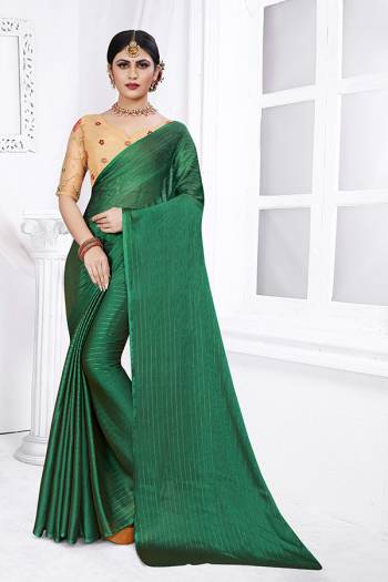 Celebrate This Festive Season In This Very Pretty Colored Wevon Jari Lining Designer Saree Paired With Contrasting Creen Colored Blouse. This Saree Are Rainbow Silk and Blouse Are Net Cotton Based Beautified With Detailed Embroidery. 