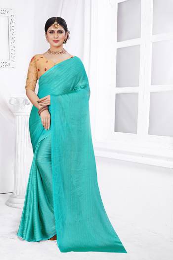 Celebrate This Festive Season In This Very Pretty Colored Wevon Jari Lining Designer Saree Paired With Contrasting Creen Colored Blouse. This Saree Are Rainbow Silk and Blouse Are Net Cotton Based Beautified With Detailed Embroidery. 