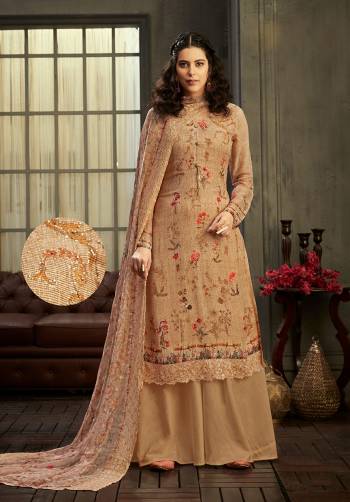 Get Ready For The Upcoming Festive And Wedding Season With This Designer Suit In Fine Light Color Paired With Dupatta. Its Heacy Digital Printed With Jari And Swaroski Work Top Is Fabricated On Viscose Bemberg Georgette Paired With Santoon Bottom And Viscose Bemberg Chiffon Fabricated Dupatta. Buy this Suit Now.