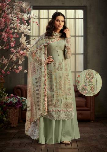 Get Ready For The Upcoming Festive And Wedding Season With This Designer Suit In Fine Light Color Paired With Dupatta. Its Heacy Digital Printed With Jari And Swaroski Work Top Is Fabricated On Viscose Bemberg Georgette Paired With Santoon Bottom And Viscose Bemberg Chiffon Fabricated Dupatta. Buy this Suit Now.