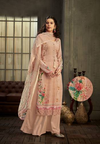 Get Ready For The Upcoming Festive And Wedding Season With This Designer Suit In Fine Light Color Paired With Dupatta. Its Heacy Digital Printed With Jari And Swaroski Work Top Is Fabricated On Viscose Bemberg Georgette Paired With Santoon Bottom And Viscose Bemberg Chiffon Fabricated Dupatta. Buy this Suit Now.