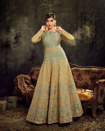 Look sensationally awesome with this lovely Slub Silk Fabric floor length Anarkali suit. The fantastic attire creates a dramatic Stone Work with wonderful heavy embroidered suit. Comes with matching bottom and Lace Border dupatta.