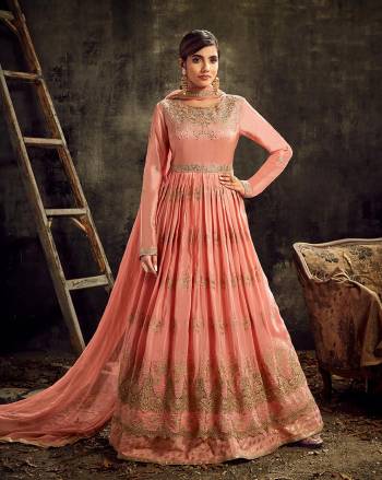 Look sensationally awesome with this lovely Upada Silk Fabric floor length anarkali suit. The fantastic attire creates a dramatic Stone Work with wonderful heavy embroidered suit. Comes with matching bottom and Lace Border dupatta.