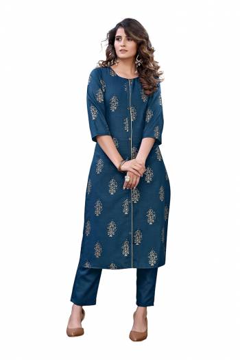 Grab This Designer Readymade Long Kurti With Pant In Fine Color Fabricated On Slab Cotton. It Is Beautified With Foil Prints And You Can Pair This Up For A Festive Look. Buy Now.