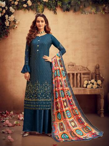 Get Ready For The Upcoming Festive And Wedding Season With This Designer Suit In Fine Color Paired With Dupatta. Its Heacy Embroidery Work Top Is Fabricated On Viscose Chinon Chiffon Paired With Santoon Bottom And Chinon Chiffon Fabricated Dupatta With Multy Color Designer Digital Printed. Buy this Suit Now.