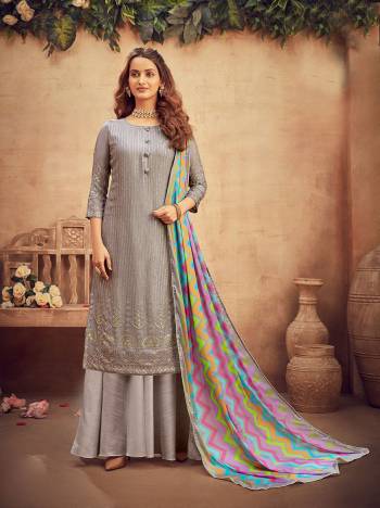 Get Ready For The Upcoming Festive And Wedding Season With This Designer Suit In Fine Color Paired With Dupatta. Its Heacy Embroidery Work Top Is Fabricated On Viscose Chinon Chiffon Paired With Santoon Bottom And Chinon Chiffon Fabricated Dupatta With Multy Color Designer Digital Printed. Buy this Suit Now.