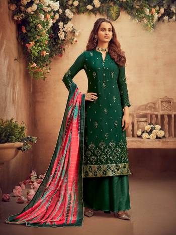 Get Ready For The Upcoming Festive And Wedding Season With This Designer Suit In Fine Color Paired With Dupatta. Its Heacy Embroidery Work Top Is Fabricated On Viscose Chinon Chiffon Paired With Santoon Bottom And Chinon Chiffon Fabricated Dupatta With Multy Color Designer Digital Printed. Buy this Suit Now.