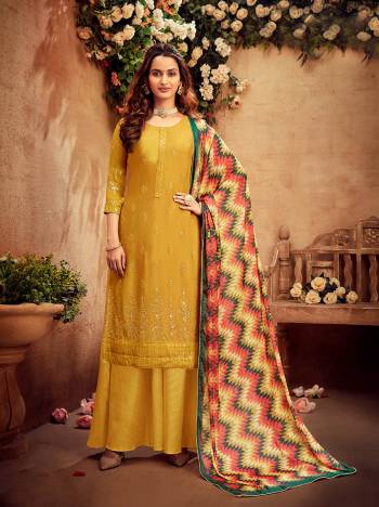 Get Ready For The Upcoming Festive And Wedding Season With This Designer Suit In Fine Color Paired With Dupatta. Its Heacy Embroidery Work Top Is Fabricated On Viscose Chinon Chiffon Paired With Santoon Bottom And Chinon Chiffon Fabricated Dupatta With Multy Color Designer Digital Printed. Buy this Suit Now.