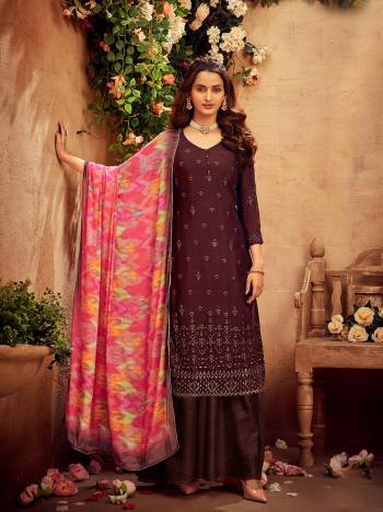 Get Ready For The Upcoming Festive And Wedding Season With This Designer Suit In Fine Color Paired With Dupatta. Its Heacy Embroidery Work Top Is Fabricated On Viscose Chinon Chiffon Paired With Santoon Bottom And Chinon Chiffon Fabricated Dupatta With Multy Color Designer Digital Printed. Buy this Suit Now.