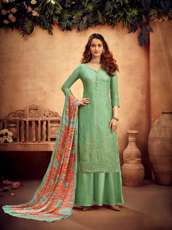 Get Ready For The Upcoming Festive And Wedding Season With This Designer Suit In Fine Color Paired With Dupatta. Its Heacy Embroidery Work Top Is Fabricated On Viscose Chinon Chiffon Paired With Santoon Bottom And Chinon Chiffon Fabricated Dupatta With Multy Color Designer Digital Printed. Buy this Suit Now.