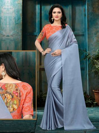 Adorn The Pretty Angelic Look Wearing This Heavy Saree In Fine Color Paired With Contrasting Colored Blouse. This Saree Is Fabricated On Satin Georgette Paired With Banglori Satin Fabricated Blouse Are Designer Printed. Its Pretty Color Pallete Will Give An Attractive Look To Your Personality. 