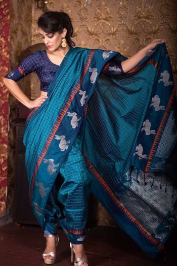 Grab This Pretty Elegant Looking Designer Party Wear Saree In Dark Color Paired With Contrasting Colored Blouse. This Saree Are Raw Silk And Blouse Are Brocade Based With Heavy Weving Designer Work Beautified Saree. Buy Now.