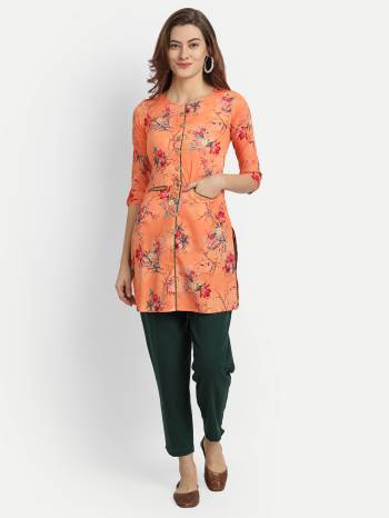 Grab This Designer Readymade Kurti In Dusty Color Fabricated On Poly Crepe. It Is Beautified With Floral Digital Printed And You Can Pair This Up For A Festive Look. Buy Now.