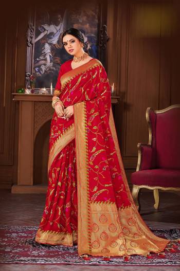 Rich Look This Pretty Elegant Looking Designer Party Wear Saree In Light Color Paired With Blouse. This Saree And Blouse Are Banarasi Silk Based With Heavy Designer Wevon Work Beautified Saree. Buy Now.