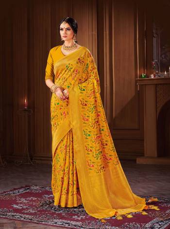 Rich Look This Pretty Elegant Looking Designer Party Wear Saree In Light Color Paired With Blouse. This Saree And Blouse Are Banarasi Silk Based With Heavy Designer Wevon Work Beautified Saree. Buy Now.