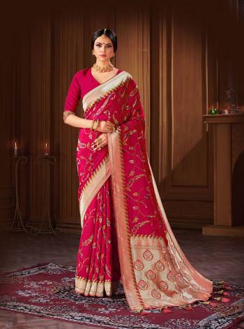 Rich Look This Pretty Elegant Looking Designer Party Wear Saree In Light Color Paired With Blouse. This Saree And Blouse Are Banarasi Silk Based With Heavy Designer Wevon Work Beautified Saree. Buy Now.