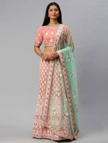 Traditional Look This Heavy Designer Lehenga Choli In All Over Light Color. This Heavy Designer Lakhnavi Embroidery Work Lehenga Choli Are Georgette And Dupatta Is Net Based Paired, It Is Beautified With Lovely Attractive Look.