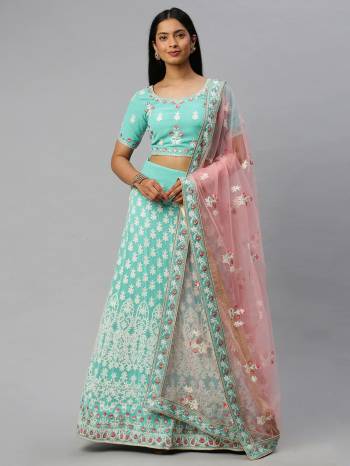 Traditional Look This Heavy Designer Lehenga Choli In All Over Light Color. This Heavy Designer Lakhnavi Embroidery Work Lehenga Choli Are Georgette And Dupatta Is Net Based Paired, It Is Beautified With Lovely Attractive Look.