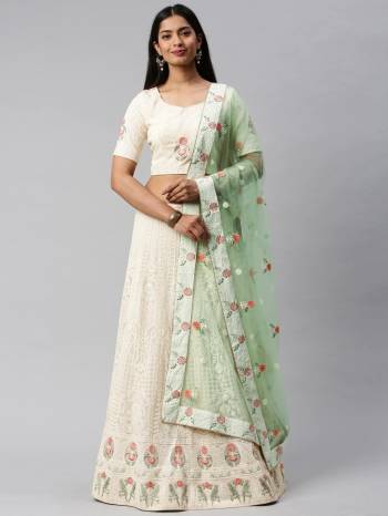 Traditional Look This Heavy Designer Lehenga Choli In All Over Light Color. This Heavy Designer Lakhnavi Embroidery Work Lehenga Choli Are Georgette And Dupatta Is Net Based Paired, It Is Beautified With Lovely Attractive Look.