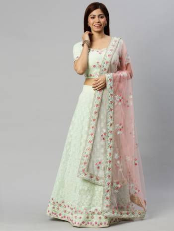 Traditional Look This Heavy Designer Lehenga Choli In All Over Light Color. This Heavy Designer Lakhnavi Embroidery Work Lehenga Choli Are Georgette And Dupatta Is Net Based Paired, It Is Beautified With Lovely Attractive Look.