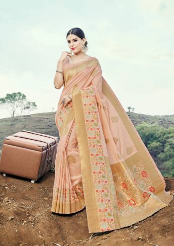 Traditioal Look This Pretty Elegant Looking Designer Party Wear Saree In Light Color Paired With Blouse. This Saree And Blouse Are Banarasi Silk Based With Heavy Weving Designer Work Beautified Saree. Buy Now.