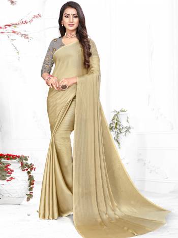 Adorn The Pretty Angelic Look Wearing This Heavy Wevon Designer Saree In Fancy Color Paired With Contrasting Grey Colored Blouse. This Saree Is Fabricated On Chiffon Paired With Micro Fabricated Blouse. Its Pretty Color Pallete Will Give An Attractive Look To Your Personality. 