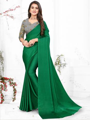 Adorn The Pretty Angelic Look Wearing This Heavy Wevon Designer Saree In Fancy Color Paired With Contrasting Grey Colored Blouse. This Saree Is Fabricated On Chiffon Paired With Micro Fabricated Blouse. Its Pretty Color Pallete Will Give An Attractive Look To Your Personality. 