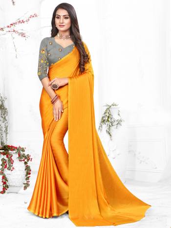 Adorn The Pretty Angelic Look Wearing This Heavy Wevon Designer Saree In Fancy Color Paired With Contrasting Grey Colored Blouse. This Saree Is Fabricated On Chiffon Paired With Micro Fabricated Blouse. Its Pretty Color Pallete Will Give An Attractive Look To Your Personality. 