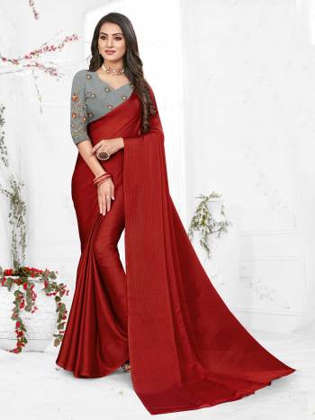 Adorn The Pretty Angelic Look Wearing This Heavy Wevon Designer Saree In Fancy Color Paired With Contrasting Grey Colored Blouse. This Saree Is Fabricated On Chiffon Paired With Micro Fabricated Blouse. Its Pretty Color Pallete Will Give An Attractive Look To Your Personality. 